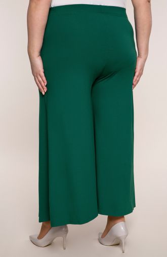 Žalias megztas sijonas ir kelnės