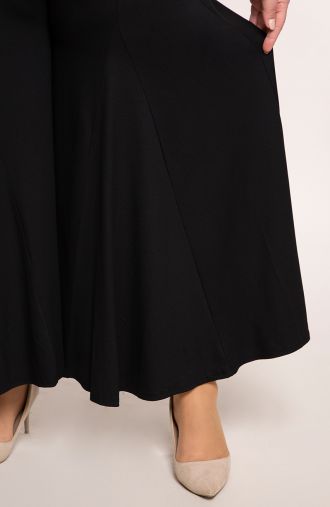 Juodas megztas sijonas ir kelnės